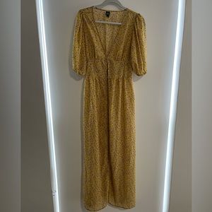 Sheer dress overlay. Wear with an underdress or leave unbuttoned as cover up.